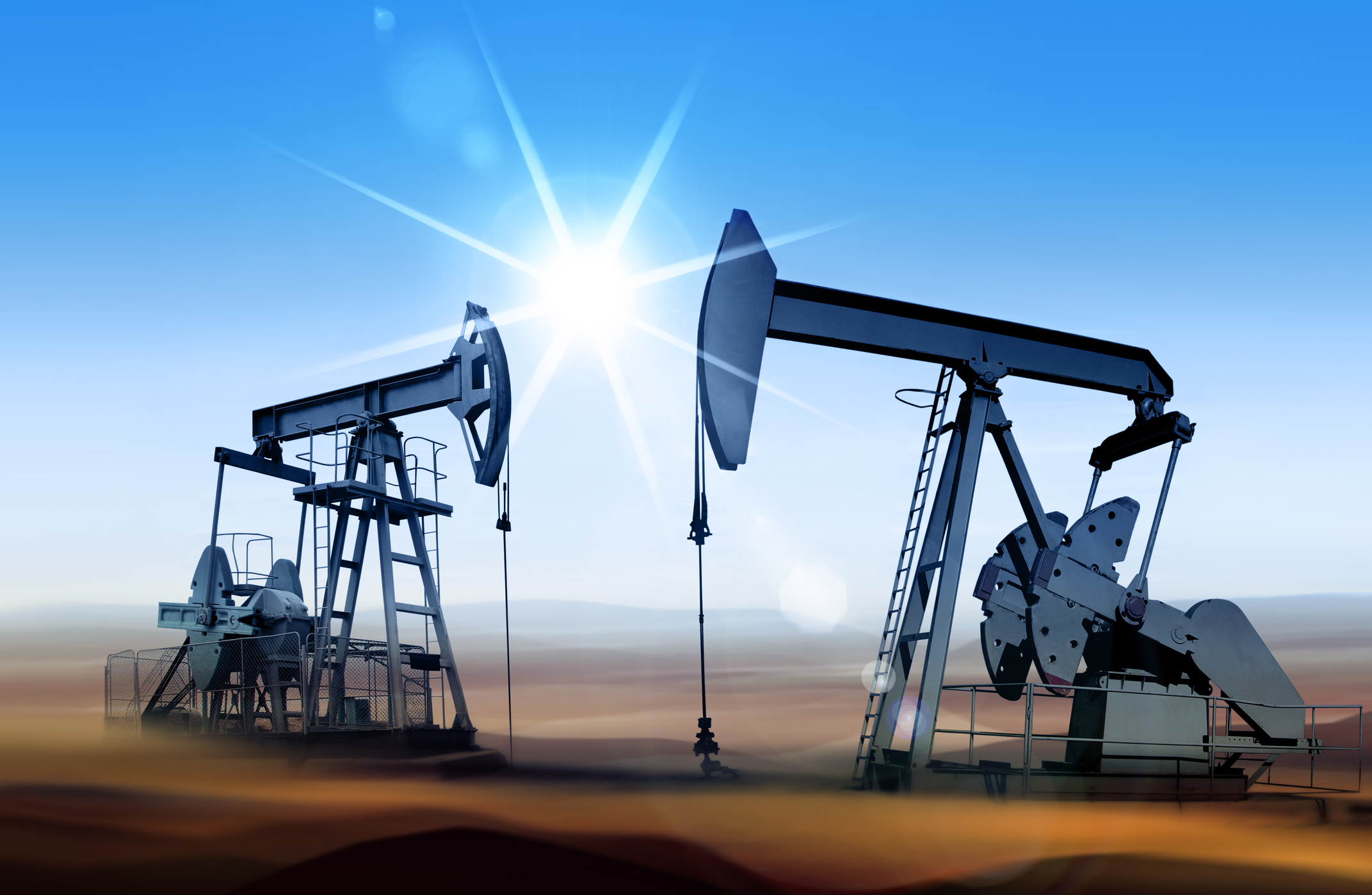 Two oil pumps in a desert
