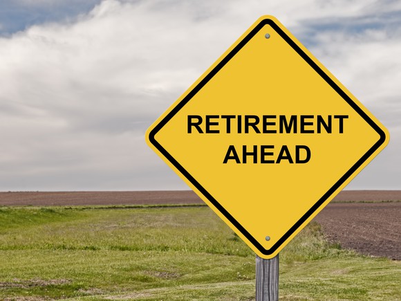 Yellow road sign that says "retirement ahead"