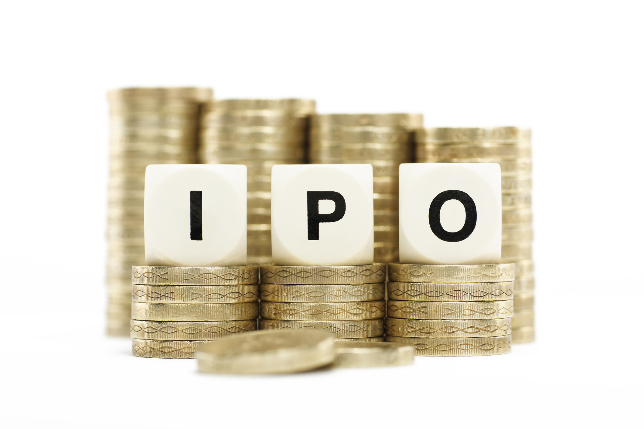 Stacks of coins with the letters IPO spelled out on top