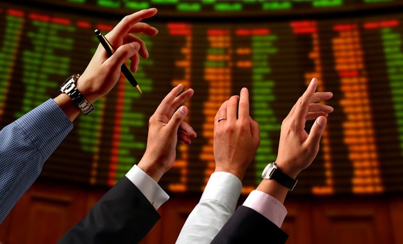 Stock Market Raising Hands Getty
