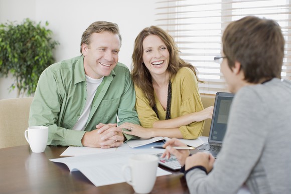 Couple Meeting With Financial Advisor Getty