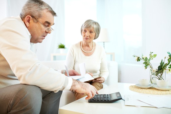 Retired Senior Couple Reviewing Finances Getty