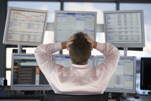 Stock Trader Frustrated By Losses Looking At Stocks Getty