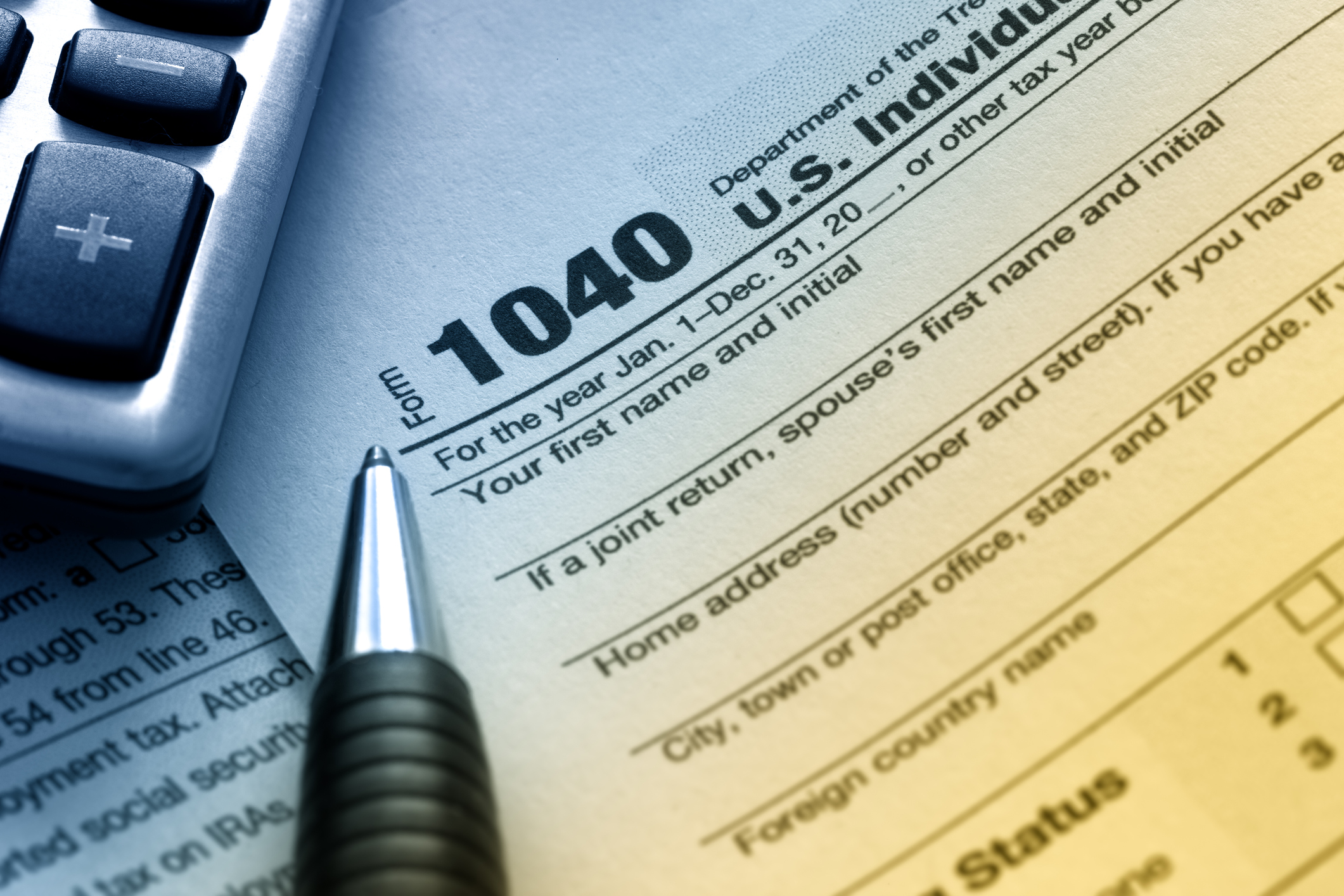 Tax forms and a calculator