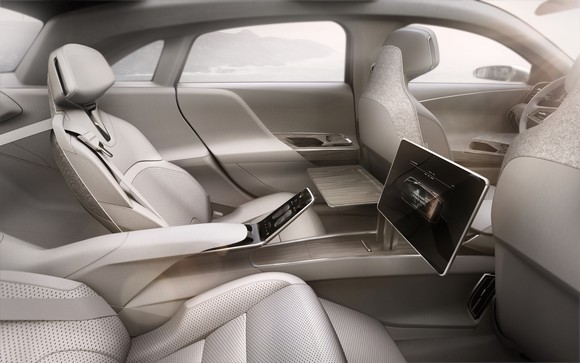 Interior of sedan, showing roomy backseat.