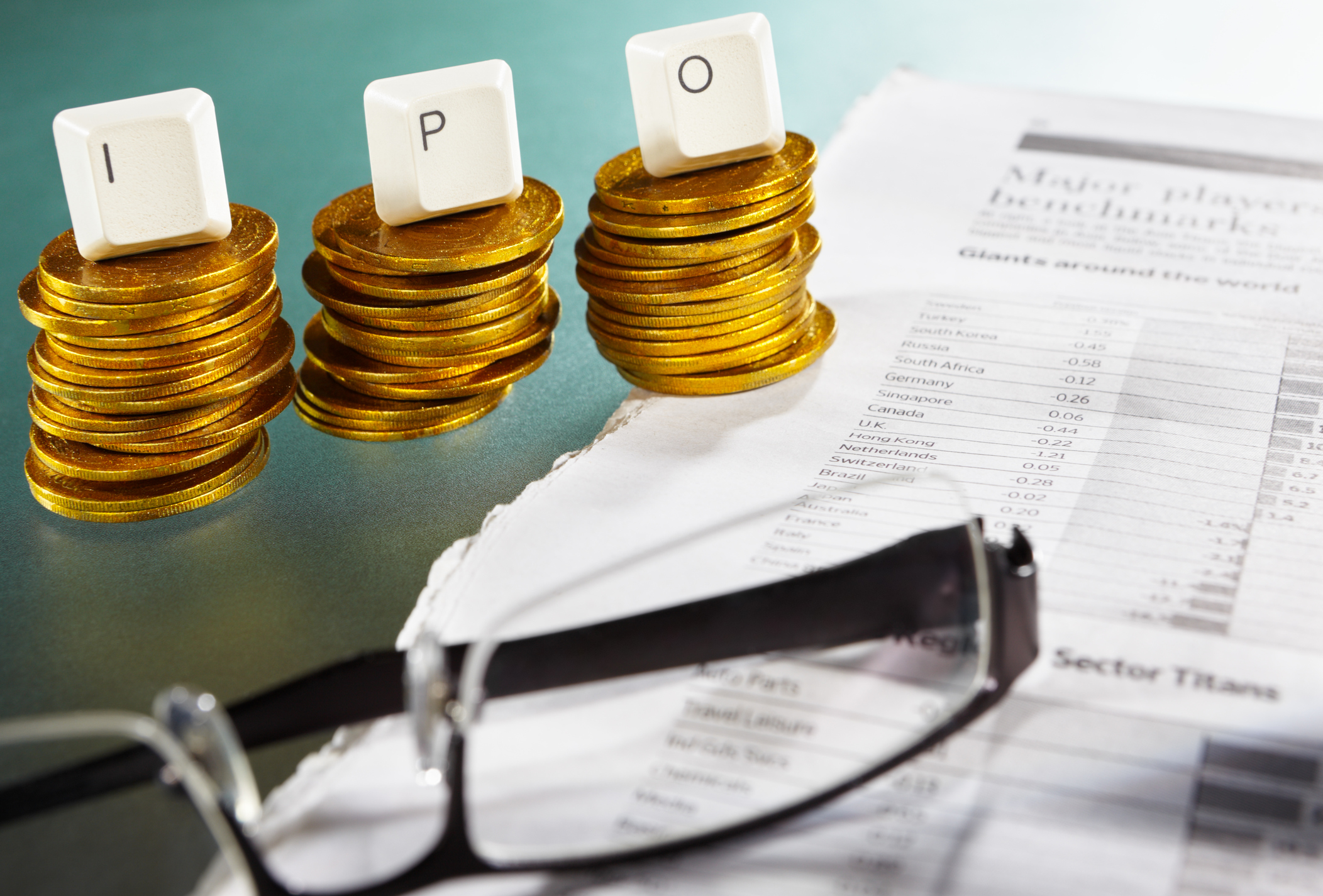 Piles of coins and financial documents