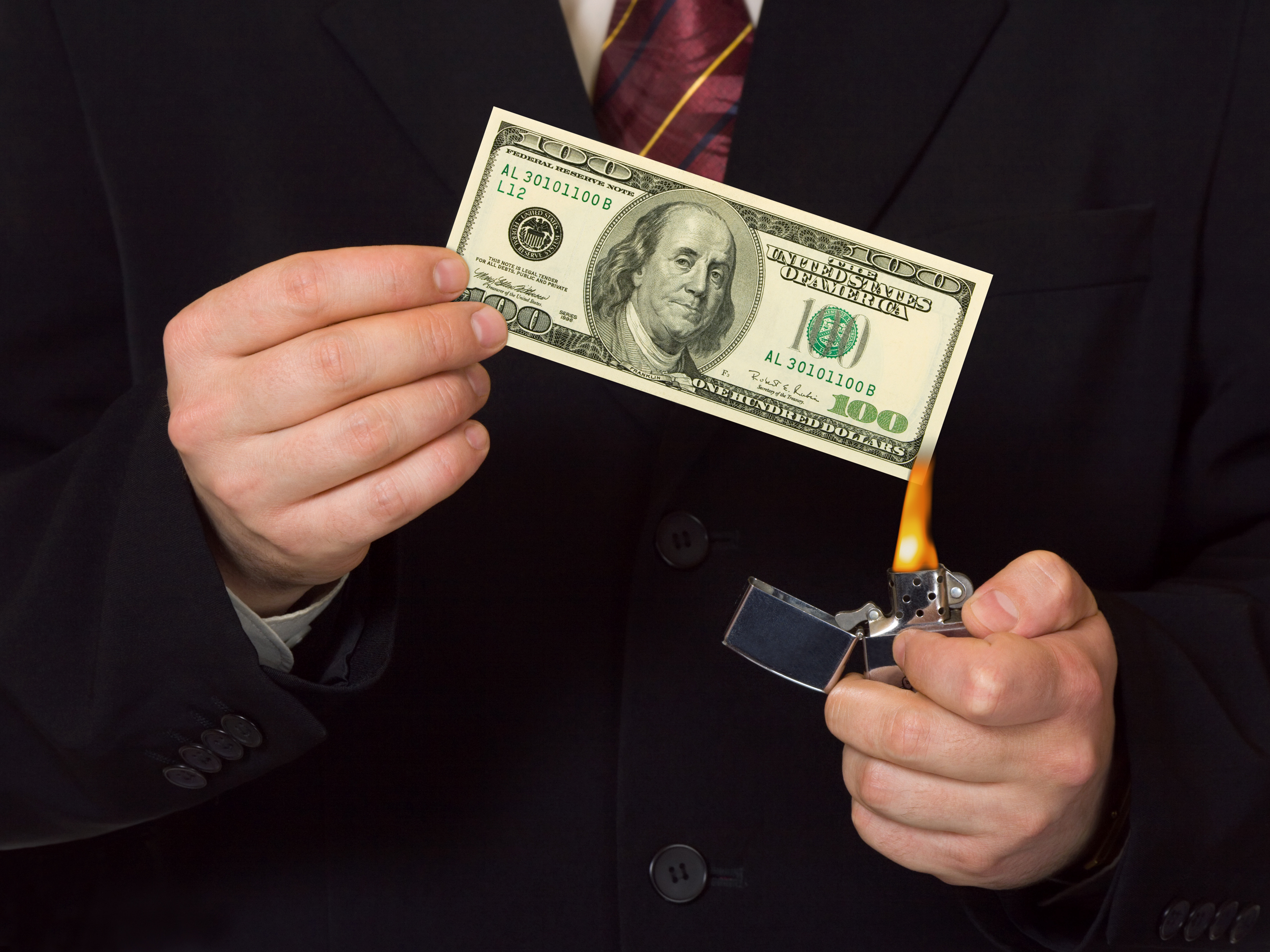 Lighting a 100 dollar bill on fire
