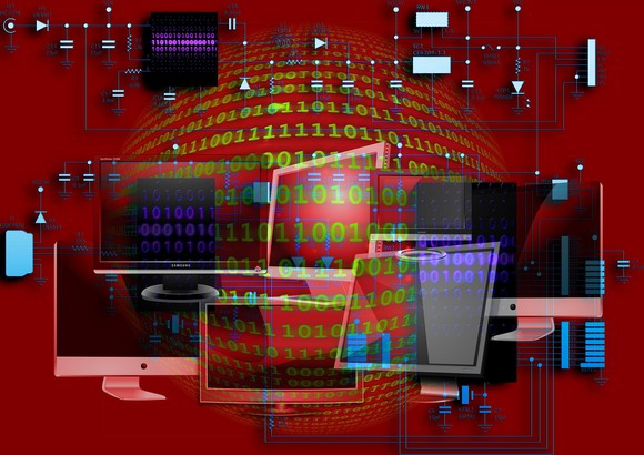 Stylized image of computer monitors and binary code.