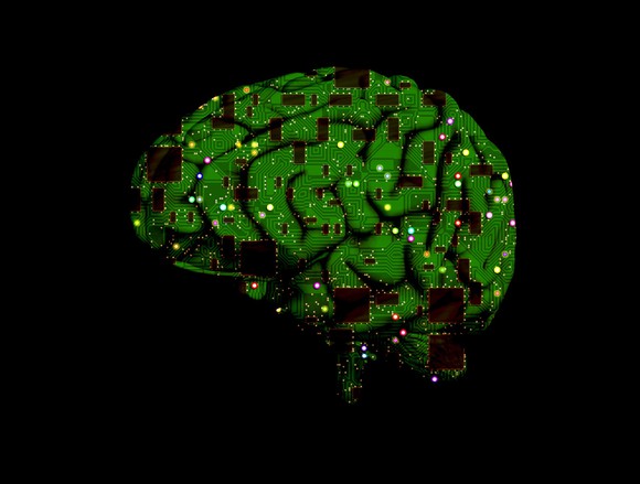 Human brain overlaid with computer circuits.