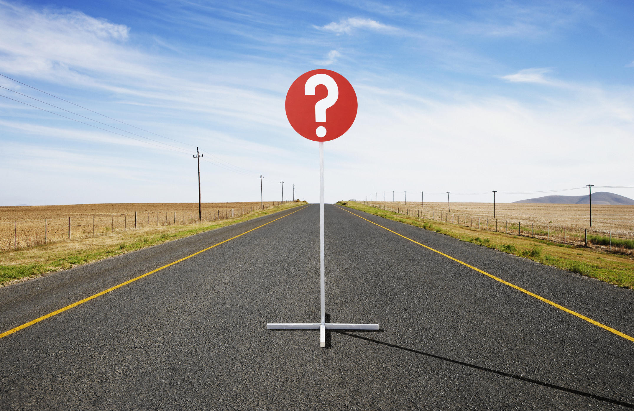 Question mark in the middle of a road.