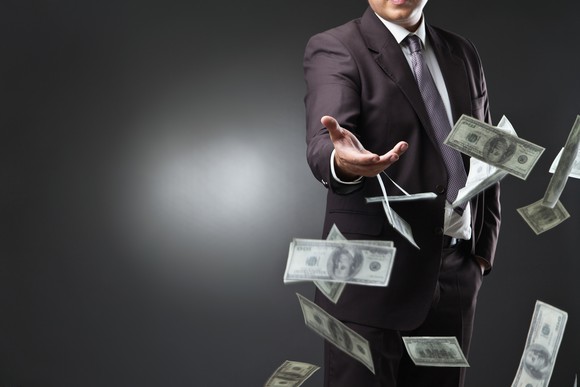 Man throwing money