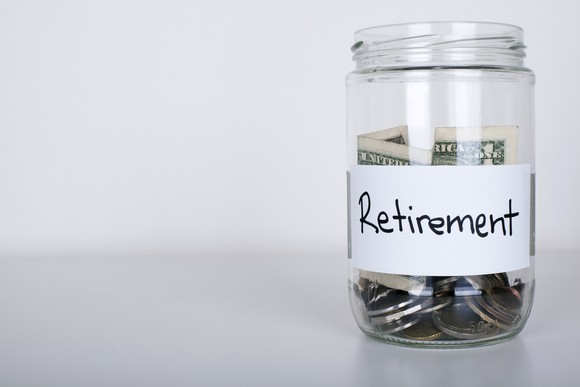 Jar of coins with "retirement" label.