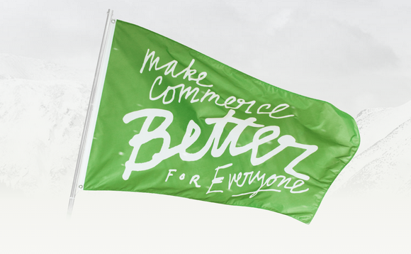 Flag that says "Make commerce better for everyone"