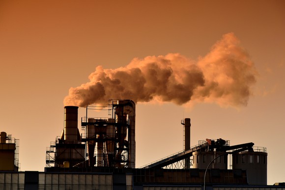 Image of a coal power plant at sunset