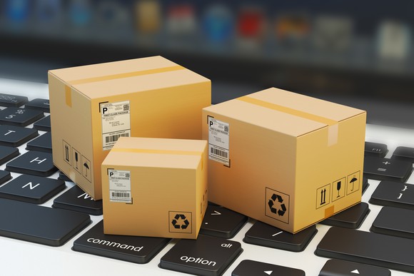 Mini packages on top of a computer keyboard