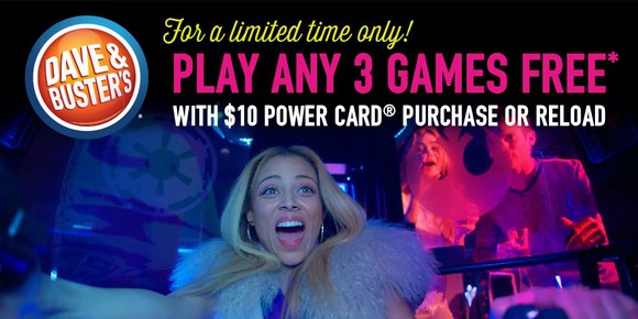 Woman having fun on ride at Dave and Buster's.