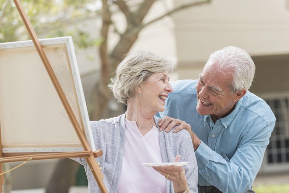 Senior couple painting