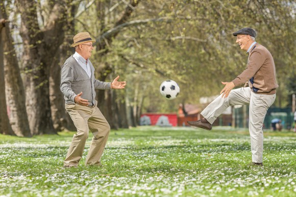 Older men playing soccer