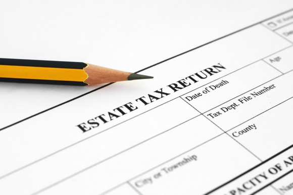 part of a form titled "estate tax return" with a pencil above it