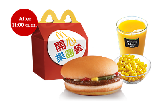 A McDonald's Happy Meal from one of its Hong Kong locations. The meal is tailored to local tastes and includes a burger, side of corn, and orange juice.