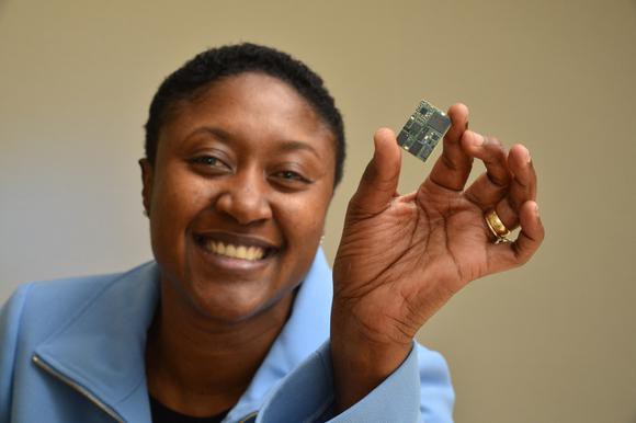 Aicha Evans, the individual responsible for running Intel's cellular modem efforts, holding up an Intel cellular modem.
