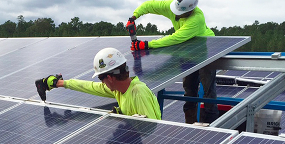 Southern Co employees working on a solar installation.