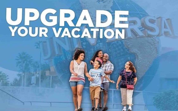 A family in front of Universal Orlando's signature globe.