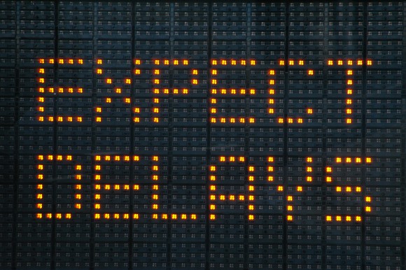 Freeway sign that says, "Expect delays"