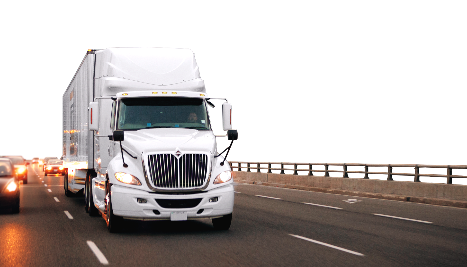 White semi truck on a road.