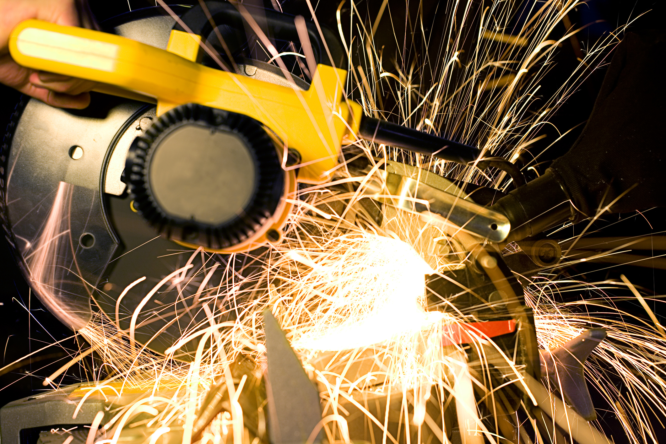 Grinder power tool in use