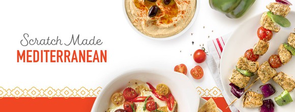 A platter of Zoe's Kitchen Mediterranean food.