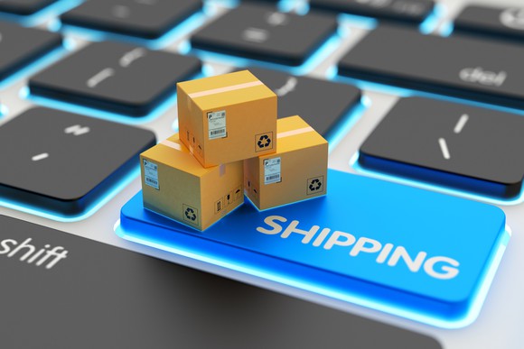 Shipping boxes on a computer keyboard
