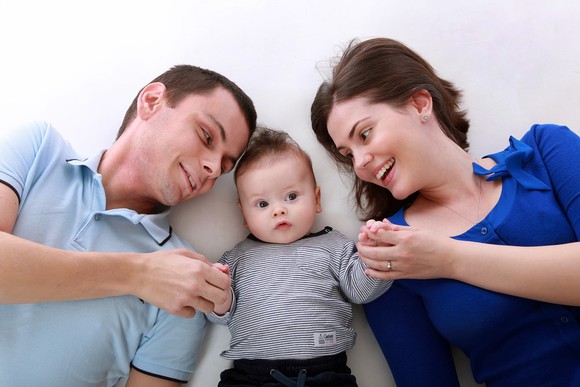 Family portrait with a toddler.