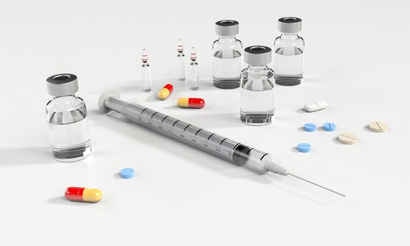Medical syringe and pills