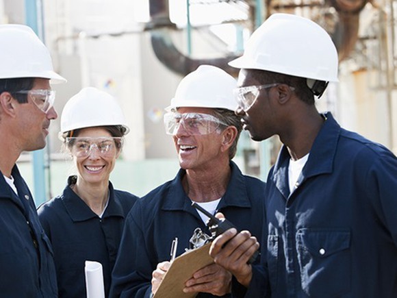 An image of Exxon Mobil employees.