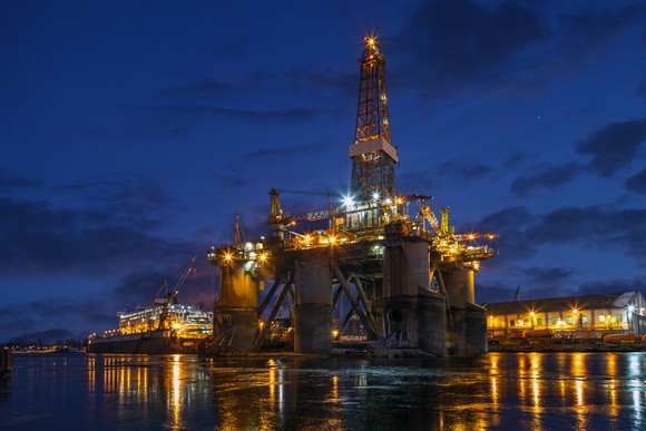 Offshore rig in dockyard at night