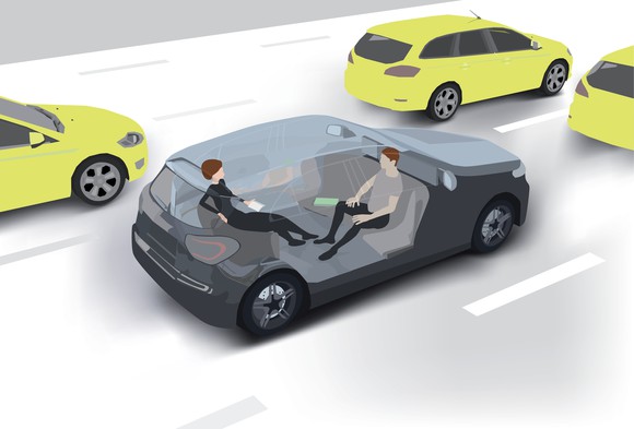 A driverless car with two passengers inside.