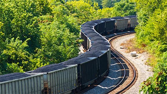 An image of a train loaded with coal.