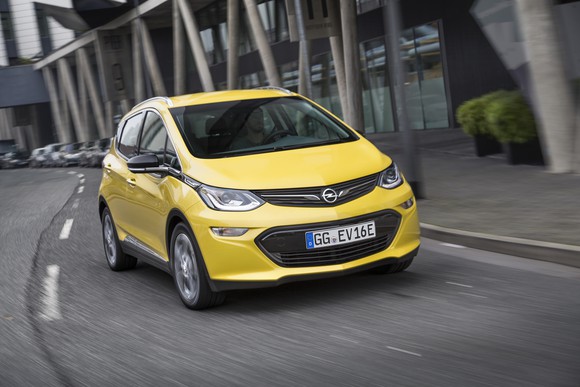 A yellow Opel Ampera-e crossover.