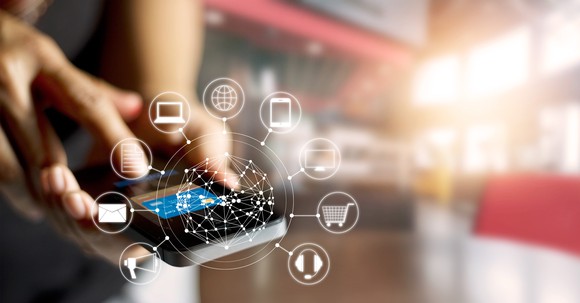 Man using mobile payments for online shopping.
