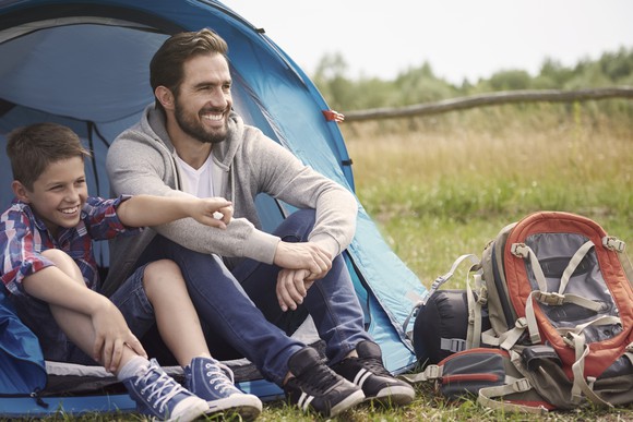 Father and son camping in the outdoors