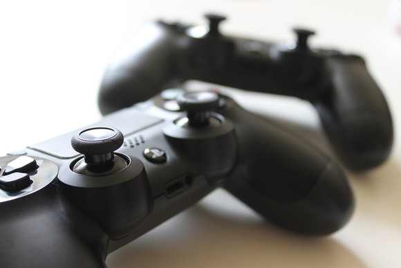 Video game controllers on a table.