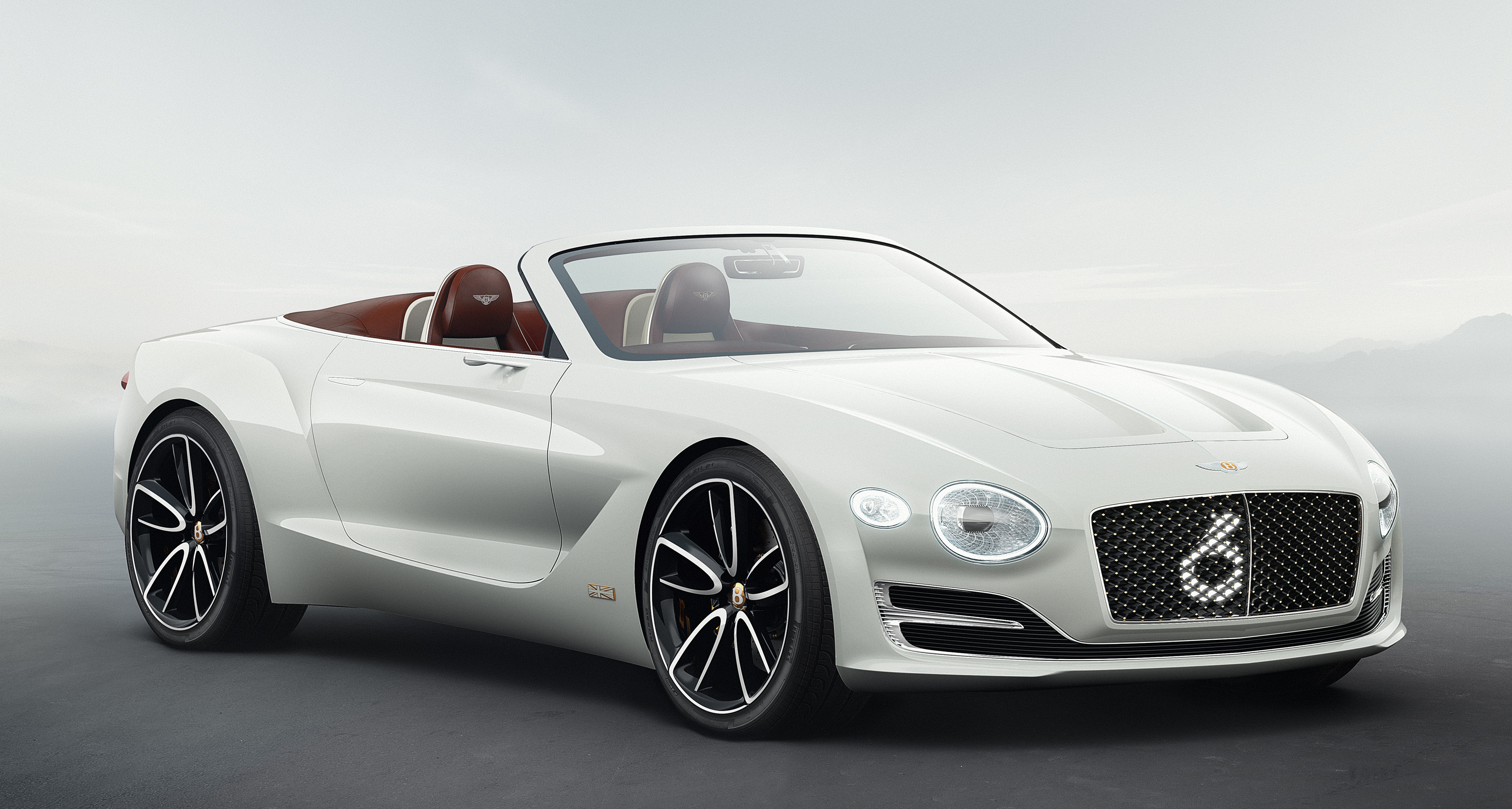 A white two-door Bentley convertible.