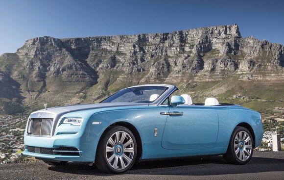 A robin's-egg blue Rolls-Royce Dawn 2-door convertible.