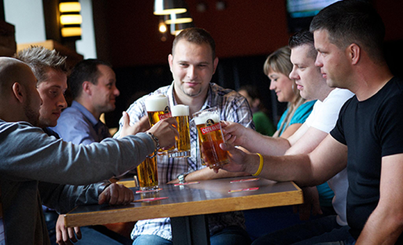 Group of friends drinking MolsonCoors beer