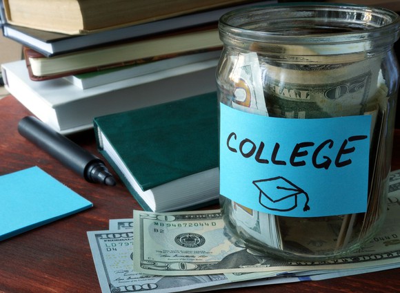 College savings jar full of money
