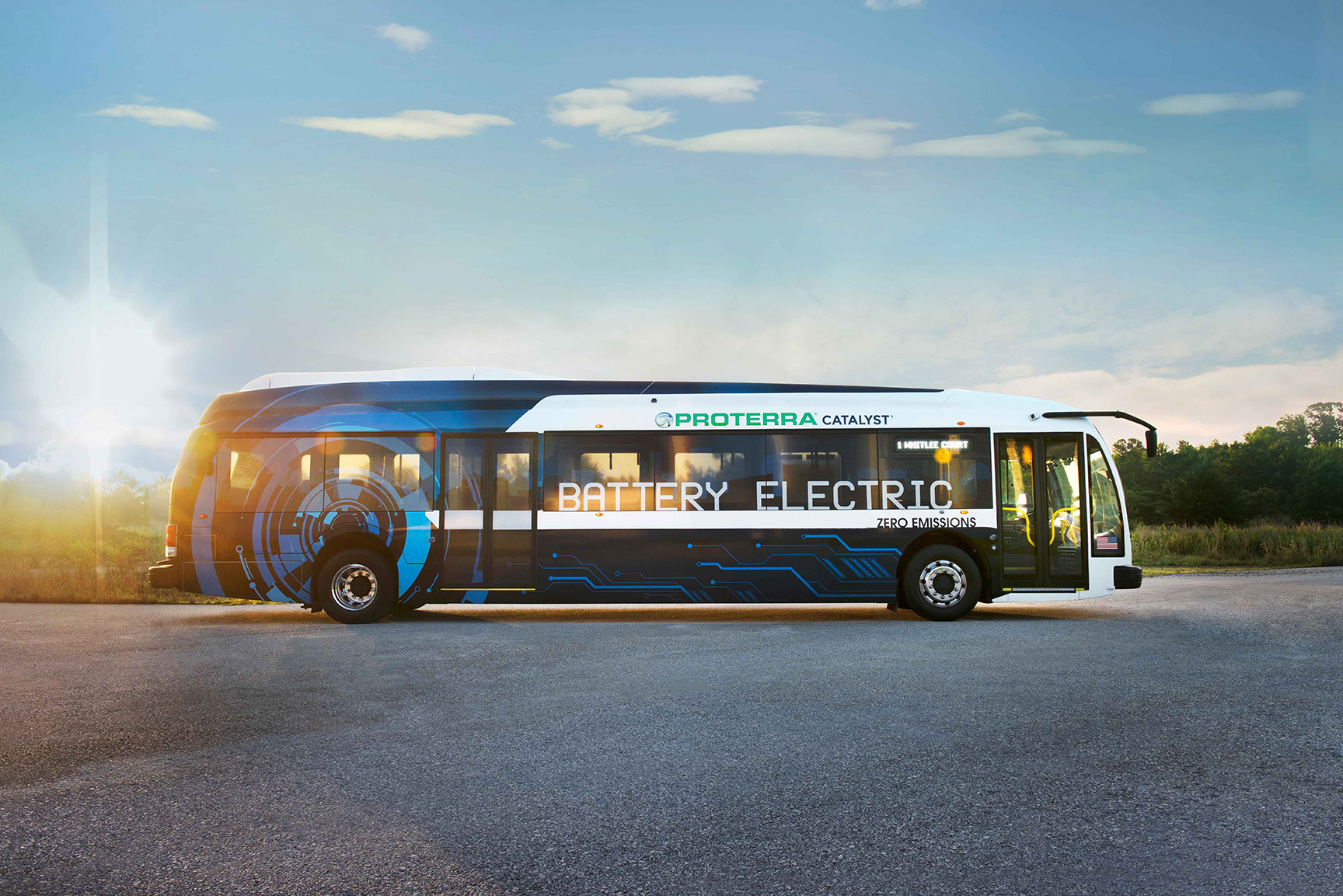 Side view of a Proterra bus, which looks very similar to a traditional city bus.