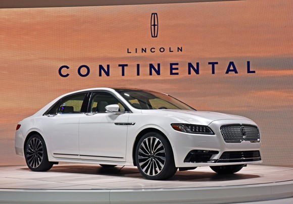 A white Lincoln Continental on display.