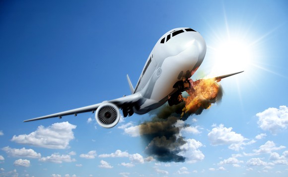 Airplane with engine on fire.