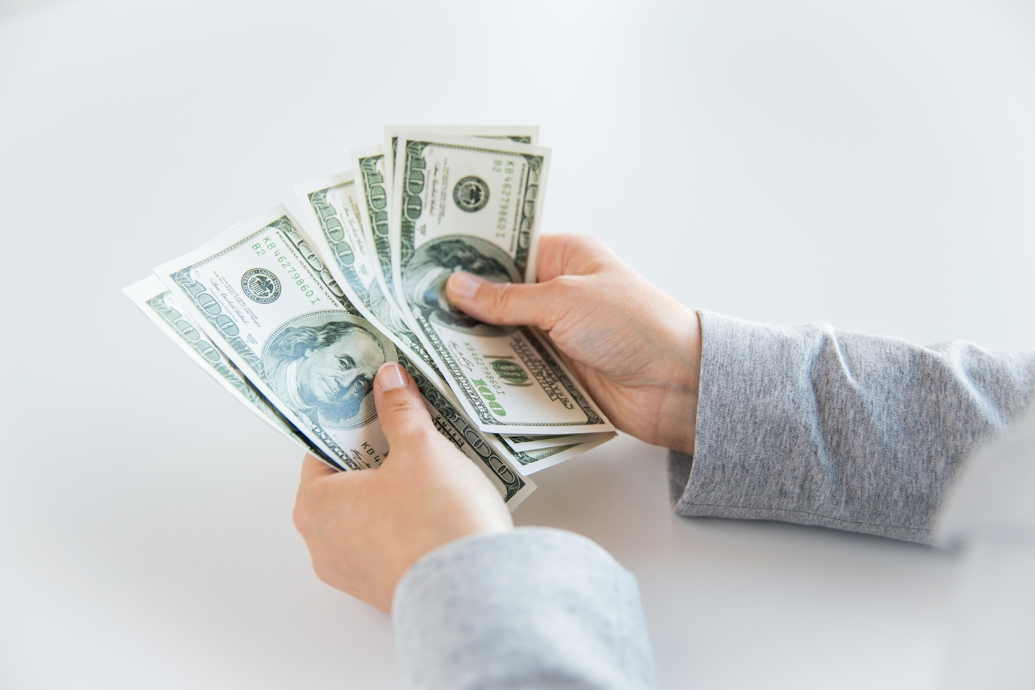 Person counting money